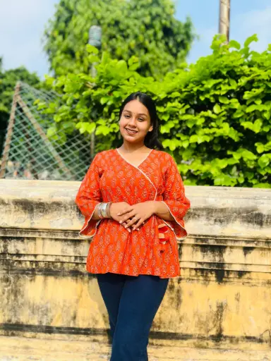 Noor-Elegant Orange Ethnic Kurti with Traditional Block Print and Handcrafted tassels 